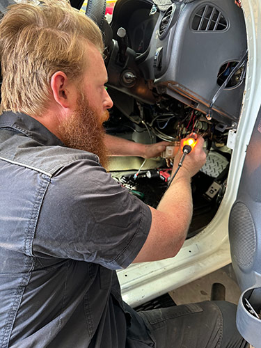 Auto Owls technician carrying out auto electrical diagnostics